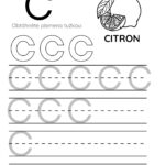 Pracovní list pro písmeno C s obrázkem citronu k vybarvení a řádky na psaní.