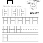 Pracovní list pro písmeno H s obrázkem hub k vybarvení a řádky na psaní.